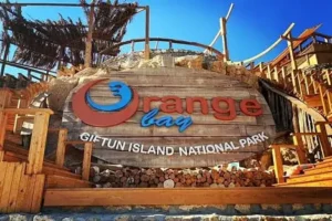 How far is Orange Bay from Hurghada by boat